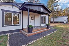 LOON LAKE HOME ON 5+ ACRES