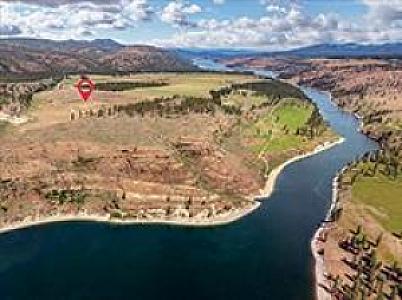 ALMOST 6 ACRES OVERLOOKING PORCUPINE BAY FOR UNDER $100K
