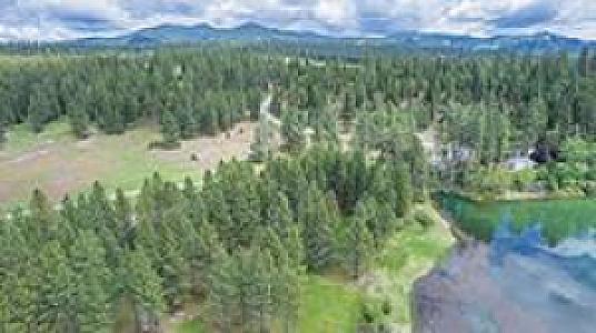 5 ACRES OF PRIMARY WATER FRONT ON THE PEND OREILLE RIVER