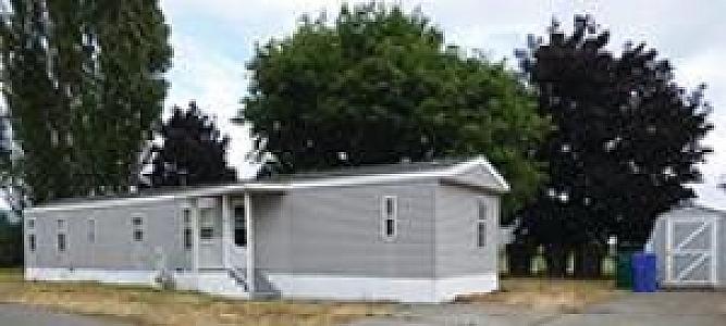 HOME IN A FANTASTIC 55+ COMMUNITY AT A GREAT PRICE!
