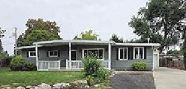 SPACIOUS RANCHER IN THE SPOKANE VALLEY WITH A SHOP!